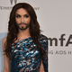 Illustration for article titled Amazing Dresses and Your Favorite Bearded Drag Queen at the amfAR Gala